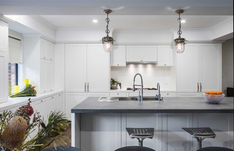 White PVC Kitchen With Grey Quartz Countertop